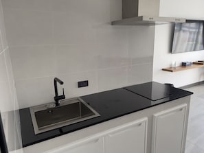 Panoramic Apartment | Private kitchen | Fridge, microwave, stovetop, espresso maker