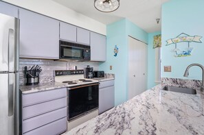 Fridge, microwave, oven, stovetop - Silver Shores 303 - A Beautiful 2 Bedroom Condo Just Steps Away From the Beach! (Ocean City)