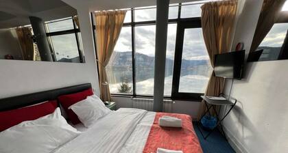 French villa on the shore of Lake Colibita