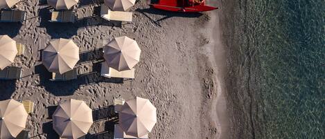 Beach nearby, white sand, sun loungers, beach umbrellas