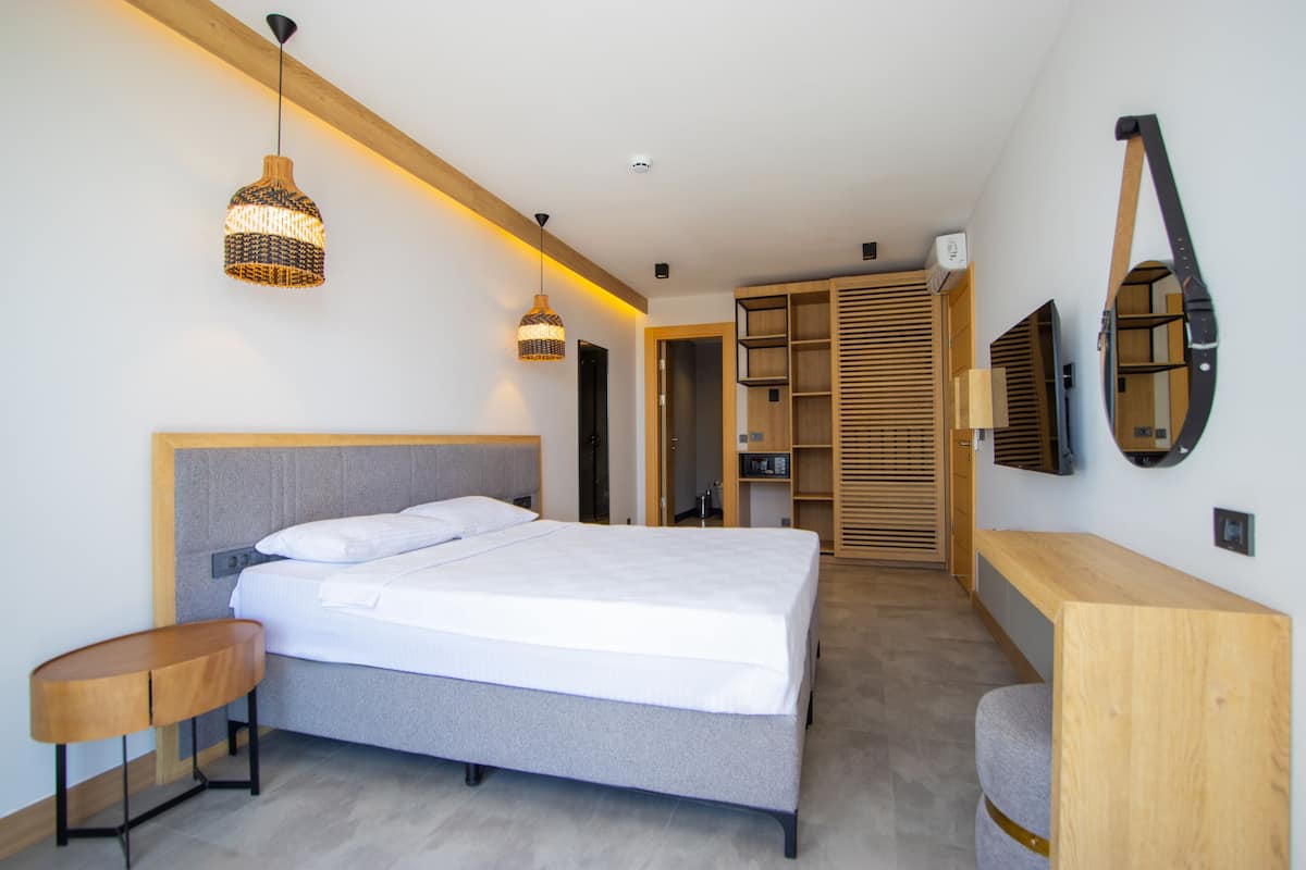 1 kamar tidur, seprai premium, minibar, dan brankas