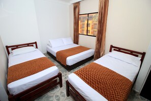 Standard Quadruple Room | Hypo-allergenic bedding, in-room safe, individually decorated - Hotel Rodadero Inn By GEH Suites (Santa Marta)