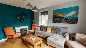 TV, fireplace, books, offices