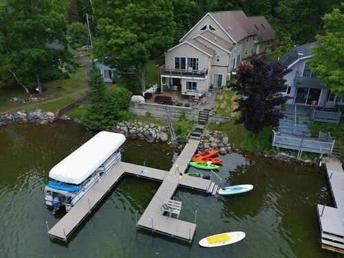 Large home on the UP's best lake! Sleeps 22! Boat to Young's Golf Course!