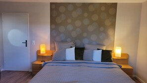 2 chambres, coffre-fort, lit de bébé portatif, accès au Wi-Fi (inclus)