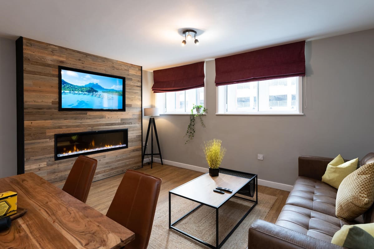 Apartamento | Área de estar | TV