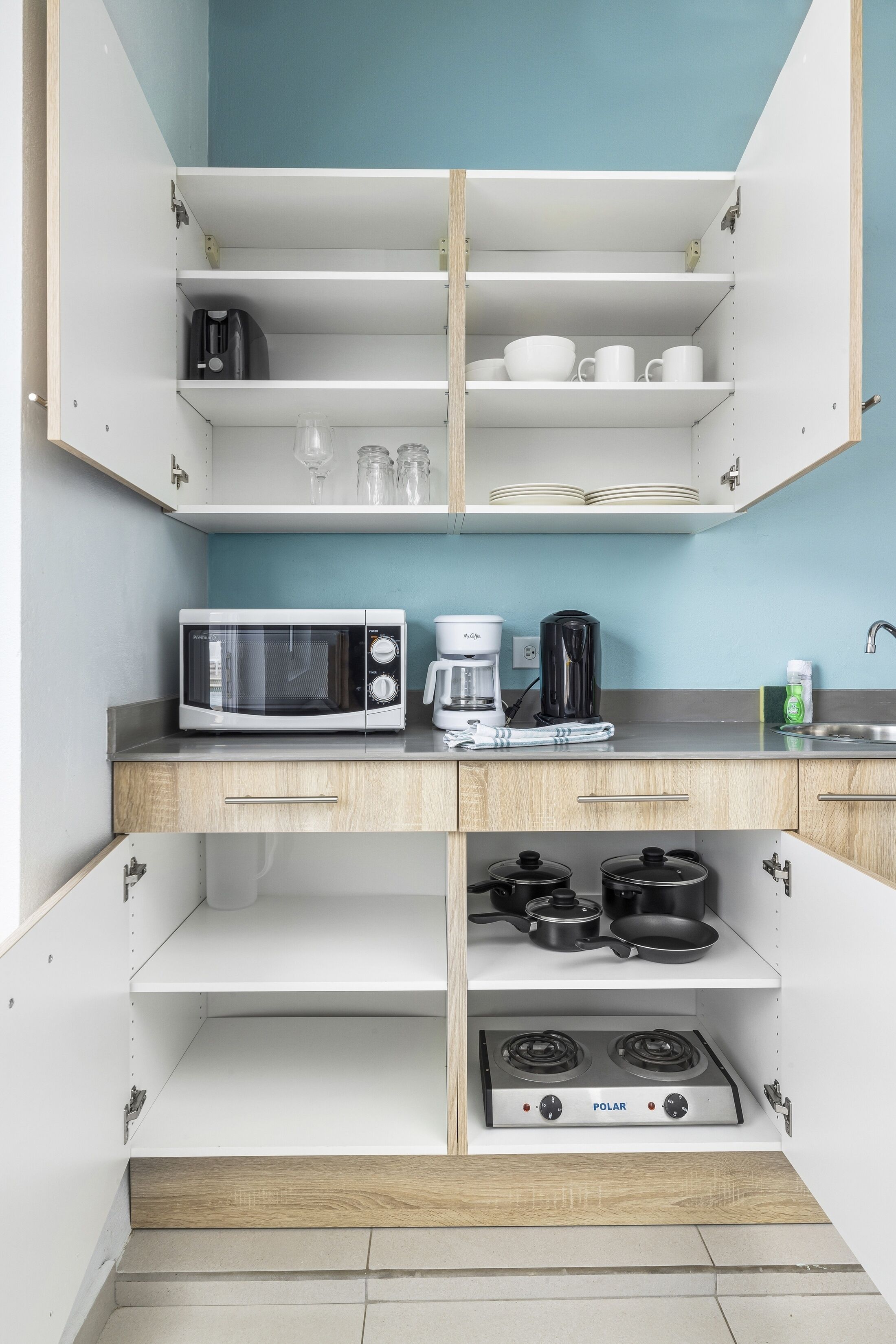 Fridge, microwave, stovetop, coffee/tea maker