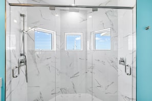 Shower, hair dryer, towels