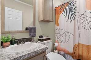 Hair dryer, towels, soap, shampoo