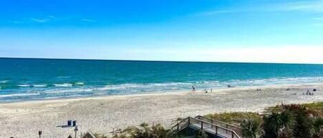 On the beach, sun loungers