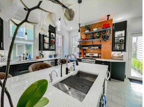 Fridge, griddle, cookware/dishes/utensils, dining tables