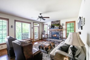 Smart TV, fireplace, books, offices