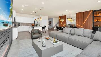 Casa empresarial | Área de sala de estar | Televisión LED de 55 pulgadas con canales digitales y televisión