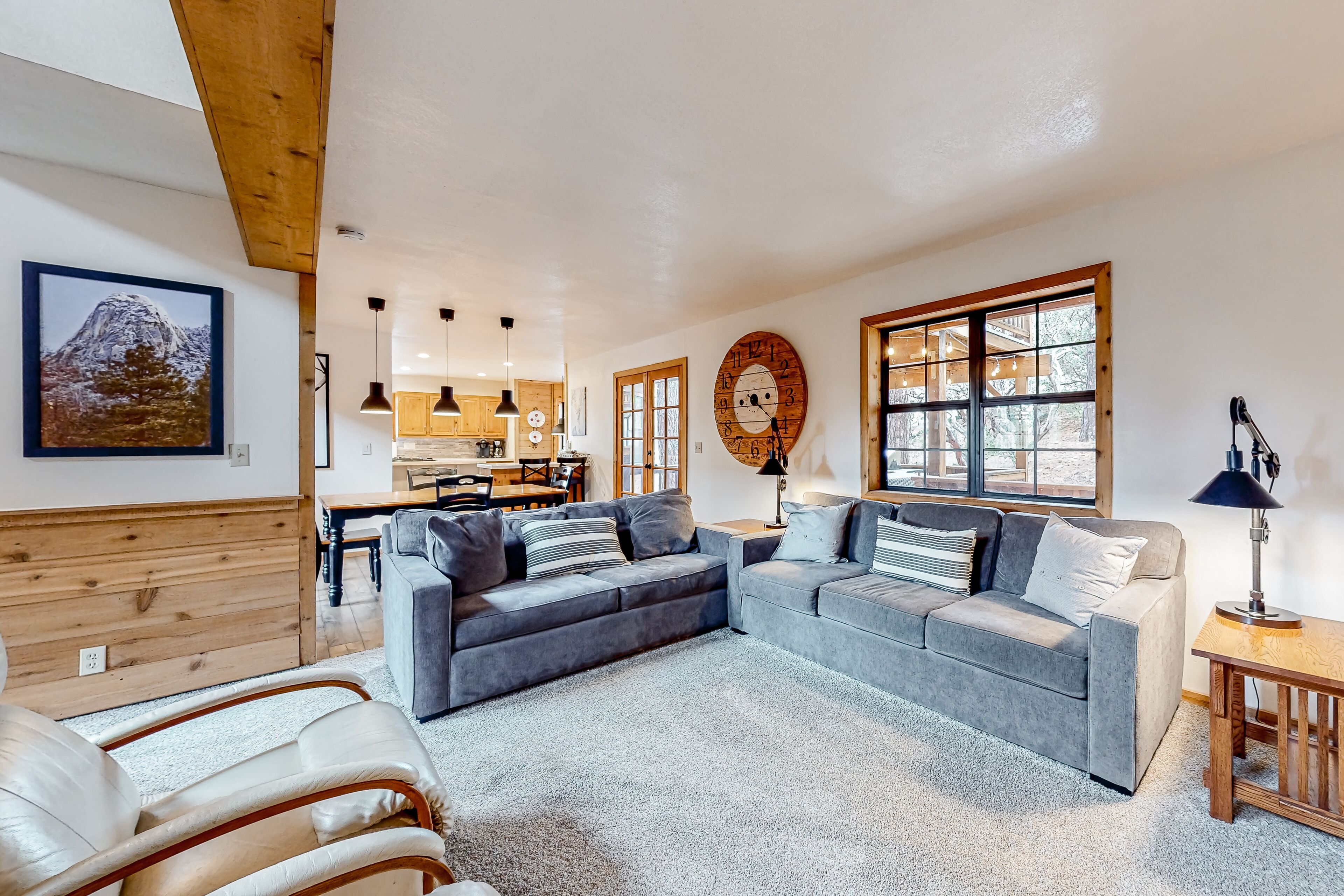 Charming dog-friendly home with covered deck, fireplace, W/D, & mountain view