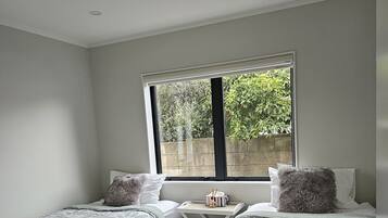 3 bedrooms, desk, iron/ironing board, travel cot