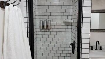 Hair dryer, towels, soap, shampoo