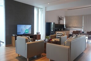 Junior Suite, 2 Bedrooms, Pool View | Living room | 55-inch Smart TV with digital channels, TV