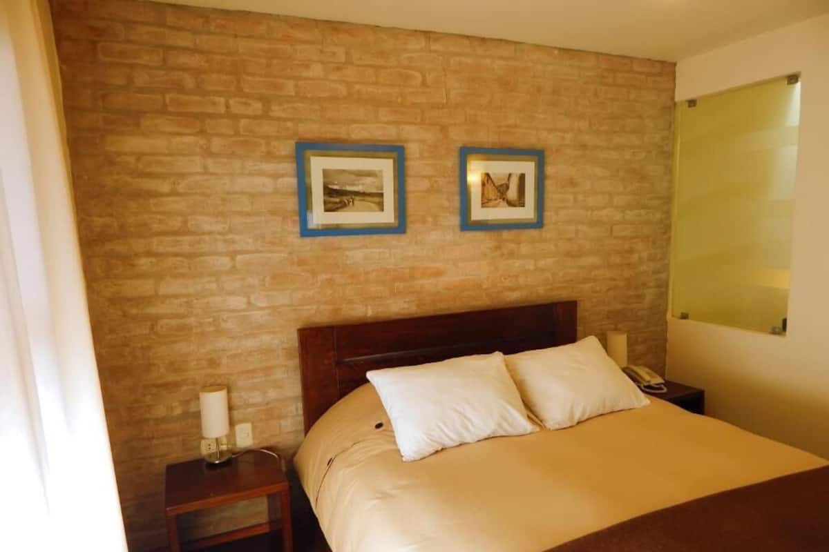 Standard Suite, Kitchenette, Courtyard Area | 2 bedrooms, premium bedding, down comforters, pillowtop beds