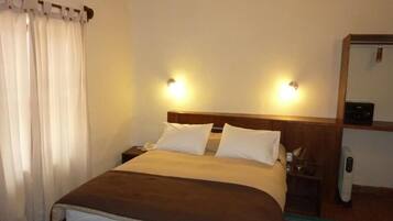 Premium bedding, down duvets, pillow-top beds, in-room safe