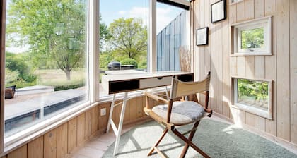 Summer house with terrace overlooking nature