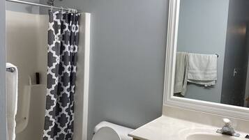 Hair dryer, towels, shampoo