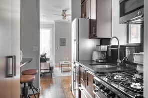 Fridge, microwave, oven, stovetop - Classic East Village 1BR w/ W/D, nr cafes, by Blueground (Downtown)