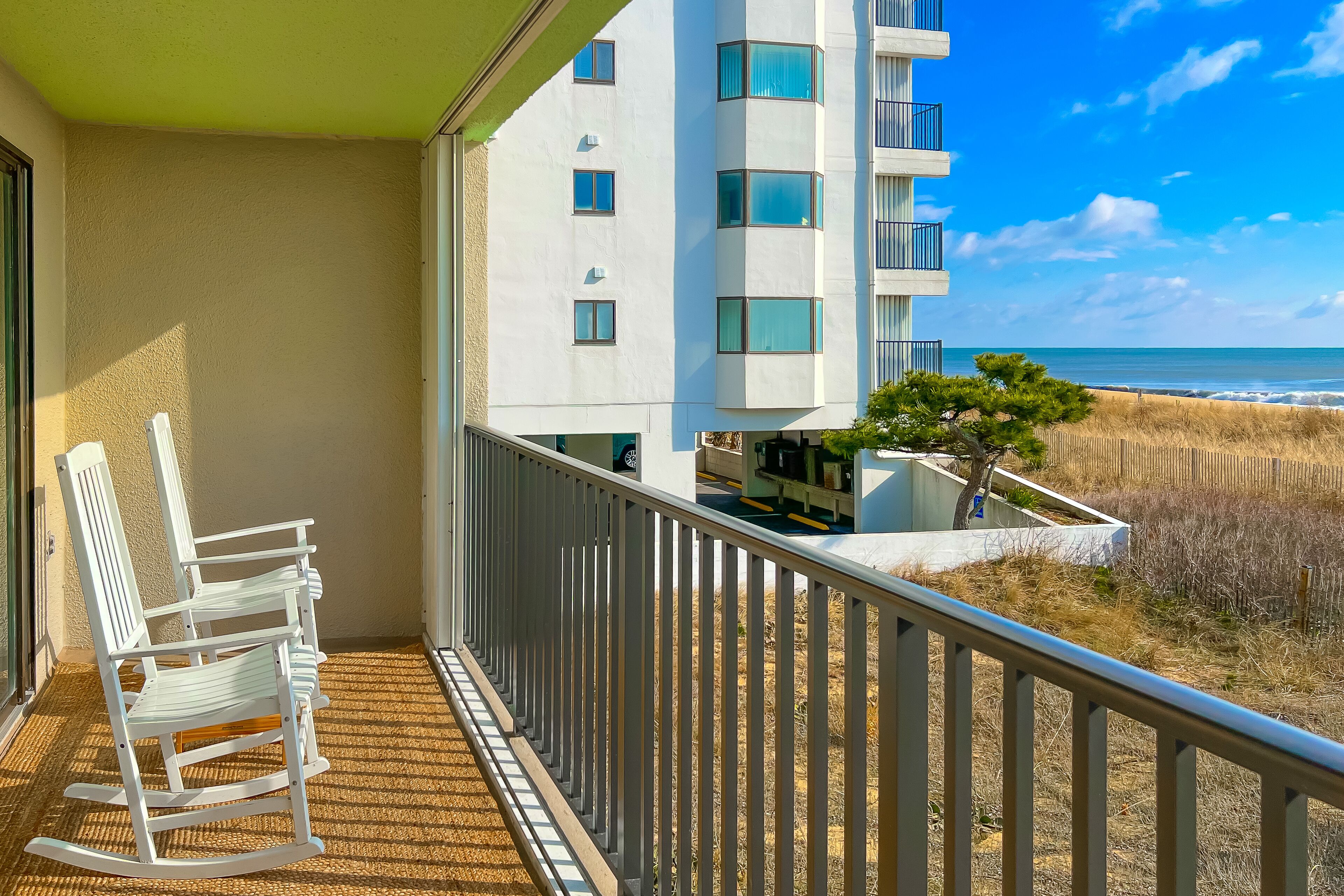 Beachfront condo with beach view & access, outdoor pool, balcony, W/D, streaming