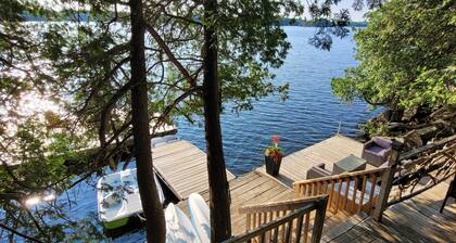 Two bedrooms and a loft with a bunkie on side lakefront cottage on Bobs Lake