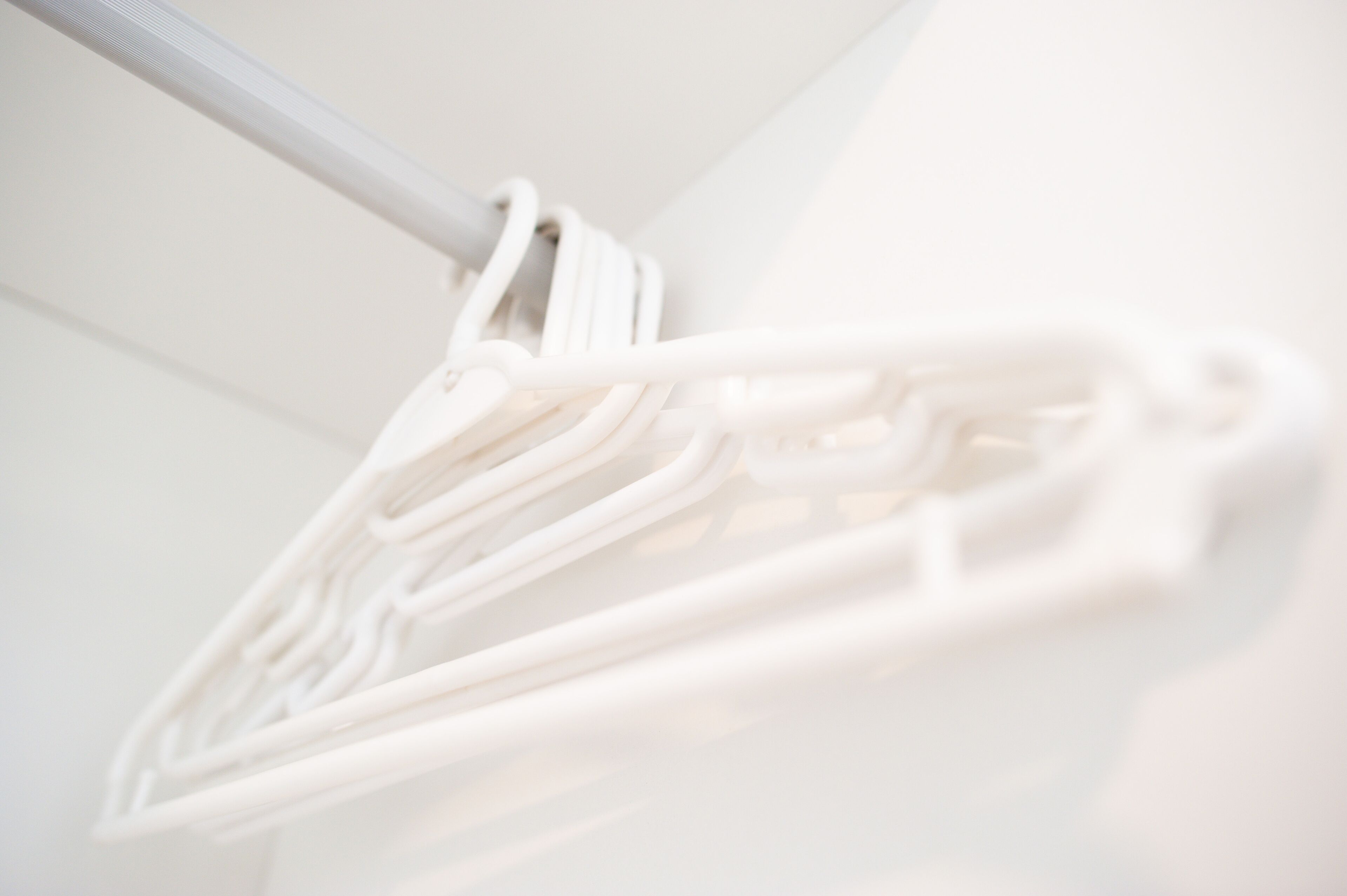 A white, modern ceiling with a clean, geometric design.