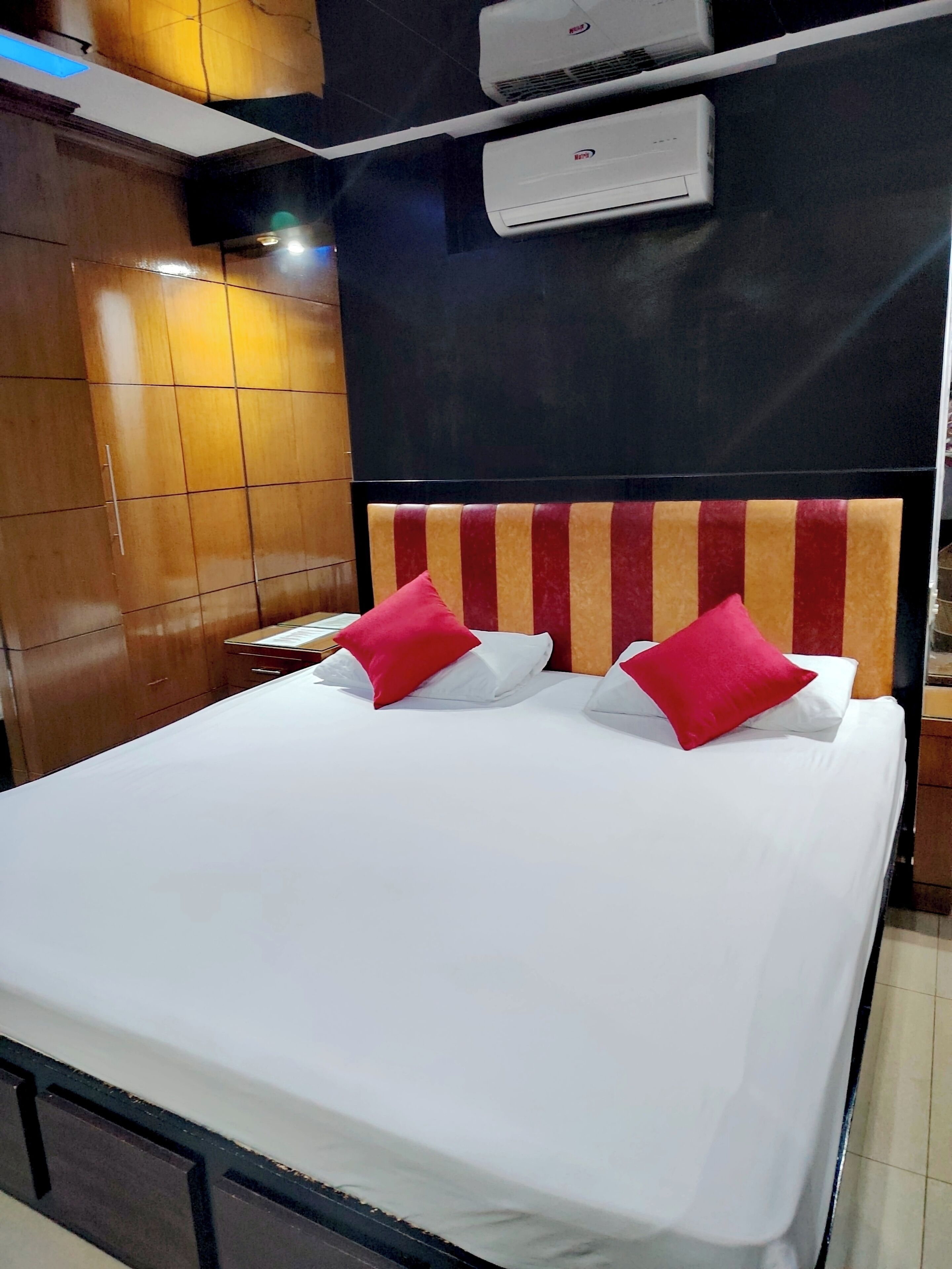 Premium bedding, down comforters, Select Comfort beds, minibar