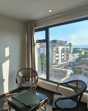 Junior Suite, 1 King Bed, Non Smoking, City View | Living area | 55-inch LED TV with digital channels, Netflix, streaming services - Fields Palace Hotel (Angeles City)