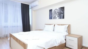 Apartamento conforto | Ferros/tábuas de passar roupa, Wi-Fi de cortesia, roupa de cama