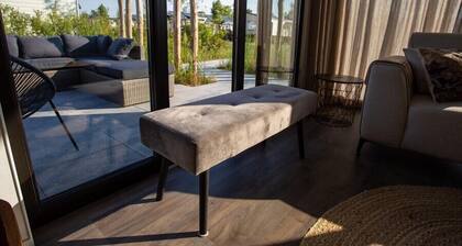 Chalet Strandloper L09 privately situated near sea and beach