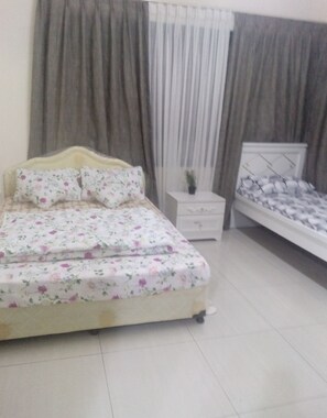 Family Studio Suite | In-room safe, desk, blackout drapes, soundproofing - ROYCE YOUTH HOSTEL L.L.C (Sharjah)