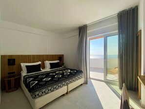 Deluxe Double or Twin Room, Sea View | Minibar, in-room safe, desk, soundproofing - Calistus Mykonos (Mykonos)