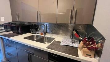 Mini-fridge, microwave, oven, dishwasher