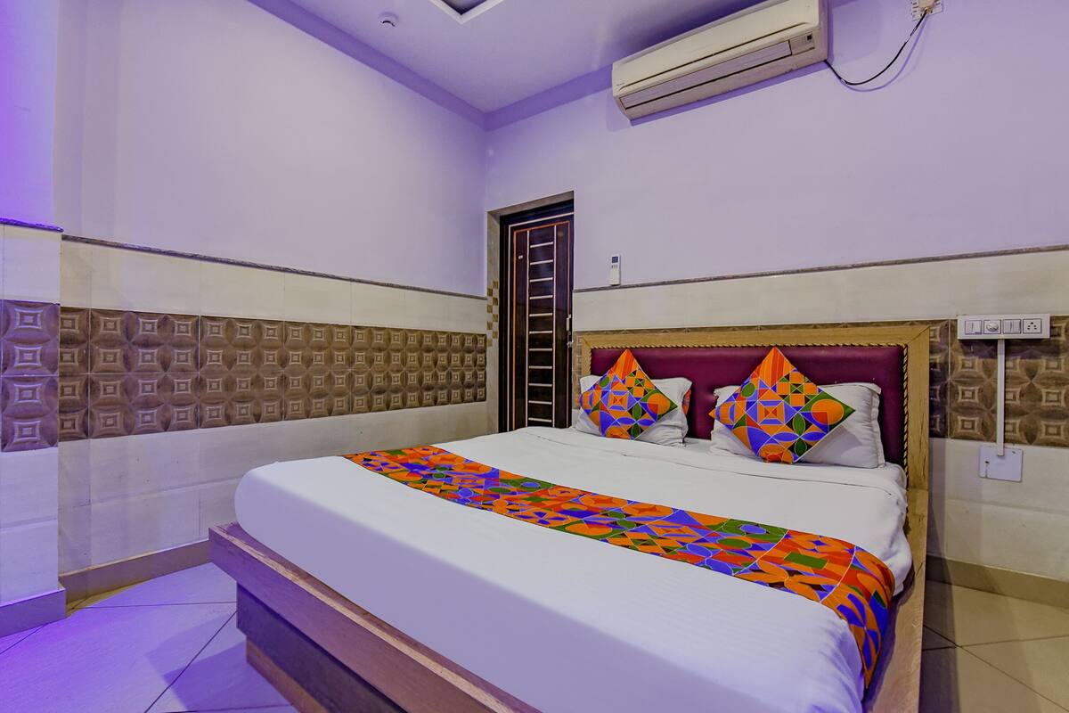 Habitación familiar | Sábanas de algodón egipcio y ropa de cama de alta calidad