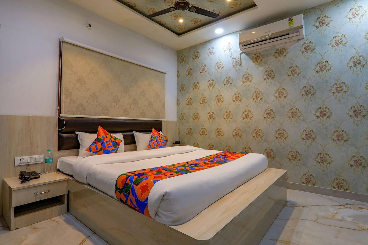 Premium kamer | Lakens van Egyptisch katoen, luxe beddengoed, een kluis op de kamer