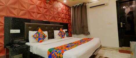 Deluxe kamer | Lakens van Egyptisch katoen, luxe beddengoed, een kluis op de kamer