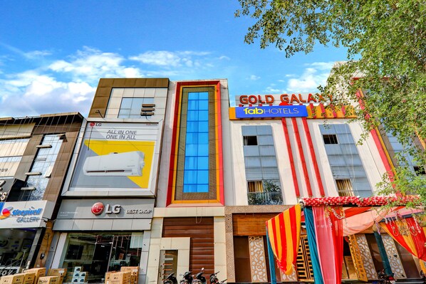A building with a sign for 'Gold Gala Hotel' and 'fab hotel'. - Fabhotel Gold Galaxy (Kanpur)