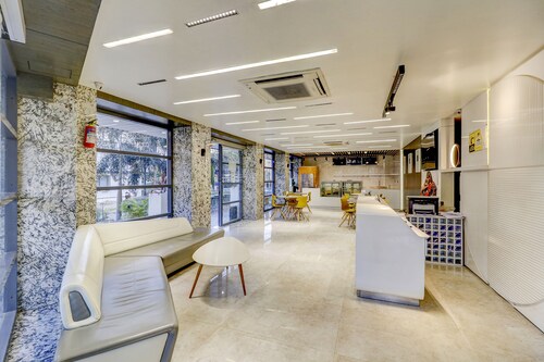 Fabhotel Prime Oasis Blue