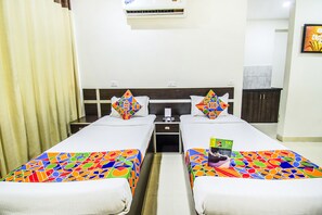 Premium Room | Egyptian cotton sheets, premium bedding, in-room safe, desk - Fabhotel Pride Inn (Hyderabad)