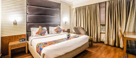 Deluxe kamer | Lakens van Egyptisch katoen, luxe beddengoed, een kluis op de kamer