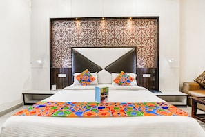 Deluxe Room | Egyptian cotton sheets, premium bedding, in-room safe, desk