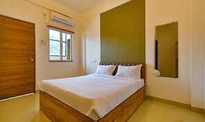 Deluxe Room | Egyptian cotton sheets, premium bedding, in-room safe, desk - FabHotel Tiru Residency (Pune)