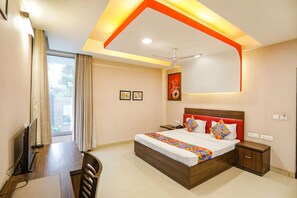 Premium Room | Egyptian cotton sheets, premium bedding, free WiFi, bed sheets - FabHotel Pine Tree (Noida)