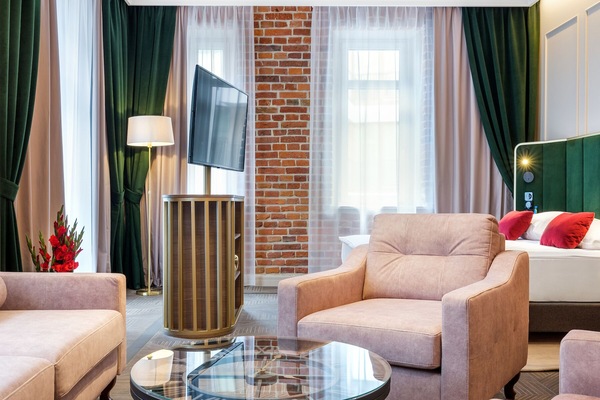 Deluxe-lejlighed | Minibar, pengeskab på værelset, skrivebord