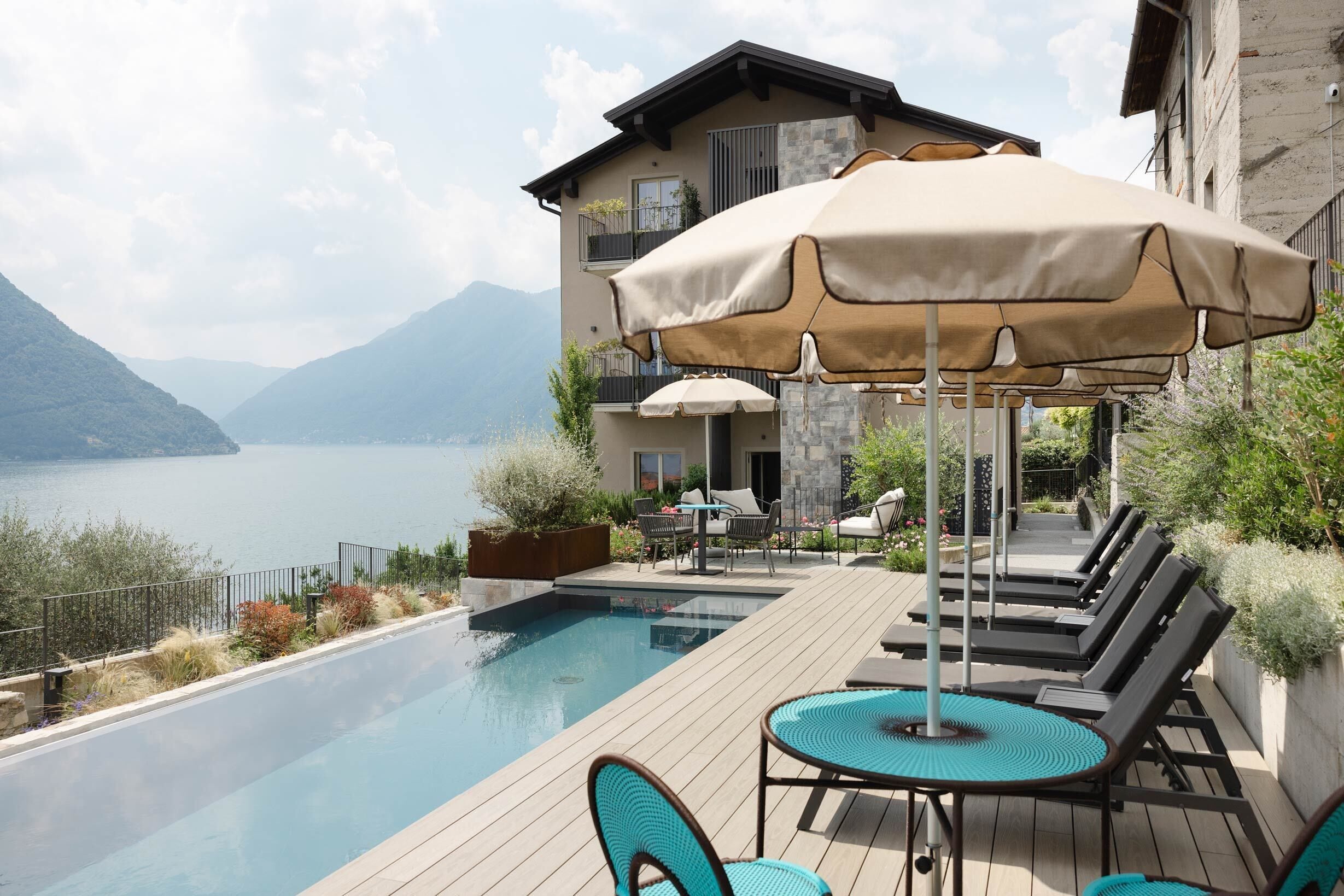 Seasonal outdoor pool, open 9:00 AM to 6:00 PM, pool umbrellas