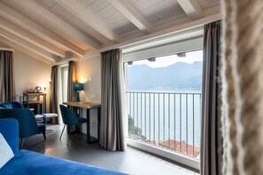 Habitación exclusiva | Ropa de cama hipoalergénica, edredón y minibar 