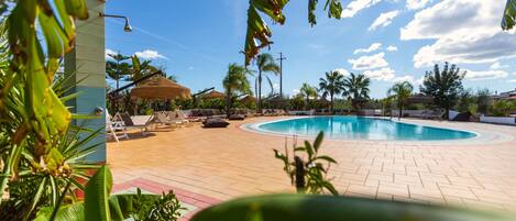 Traditional Villa | Outdoor pool | Seasonal outdoor pool, open 8:30 AM to 8:00 PM, pool umbrellas